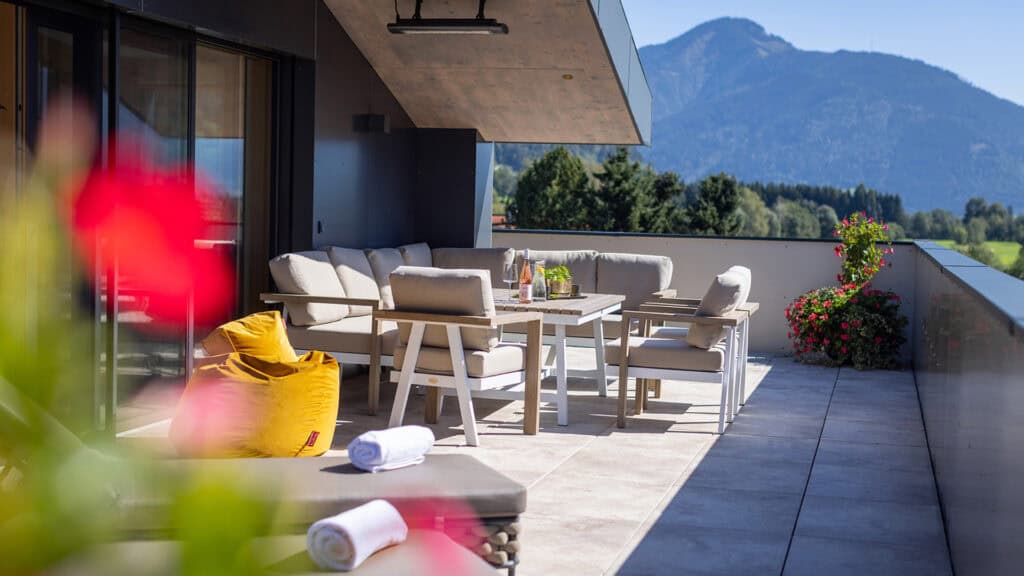Penthouse terrace mountain view Kitzsteinhorn lounge furniture glacier