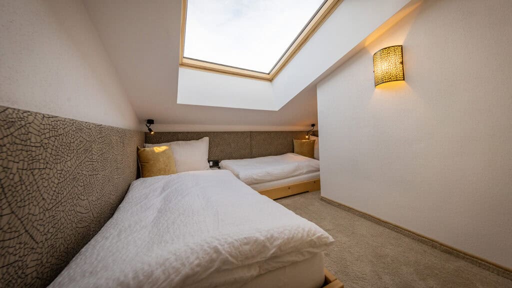 Penthouse bedroom single beds